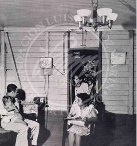 Family listening to the radio in a rural home in Puerto Rico, circa 1950. Source: Colección Fundación Luis Muñoz Marín. 